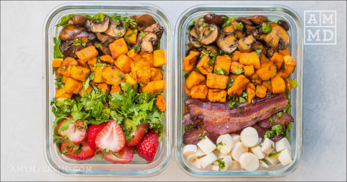 Two containers of paleo breakfast meal prep with sweet potatoes, bacon, mushrooms, and leafy greens