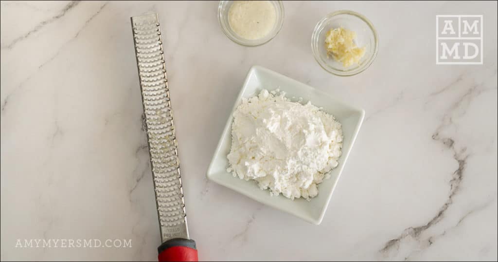 A bowl of tapioca starch used for coating shrimp for an AIP-friendly bang  bang shrimp recipe 