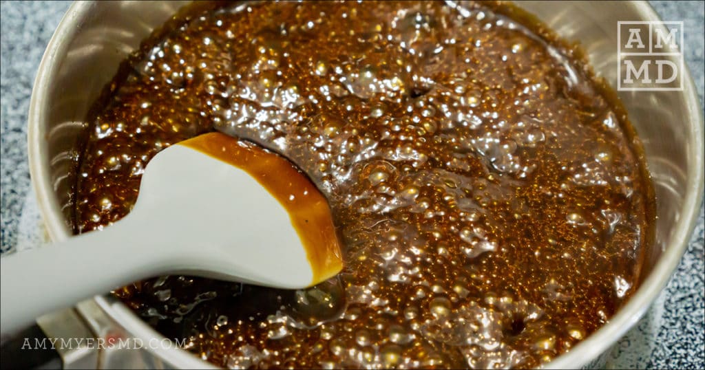 Coconut cream & coconut sugar melting in a saucepan to create a AIP-friendly sea salt caramel sauce