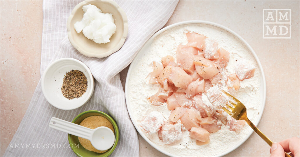 Coating the chicken - Gluten Free Orange Chicken - Amy Myers MD®